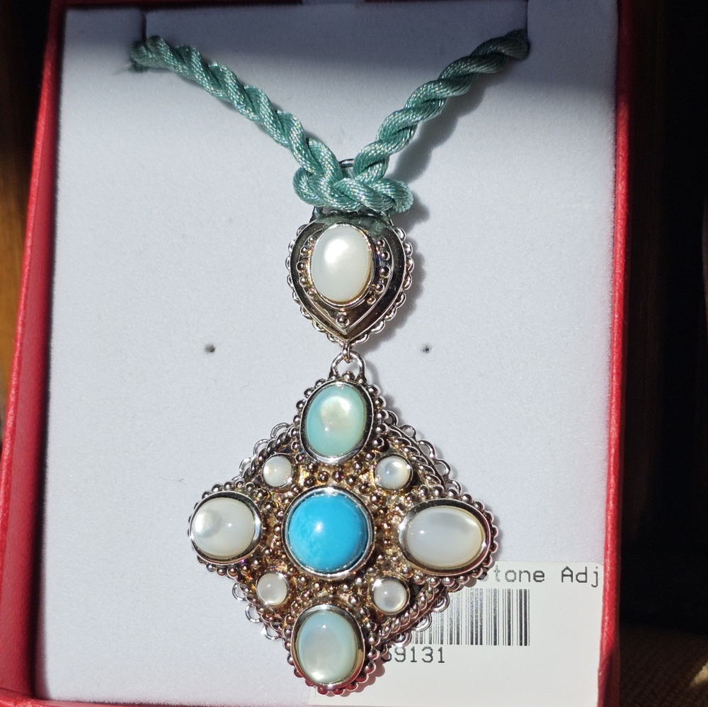 New in box sterling turquoise &mother of pearl necklace. Old stock. Adjustable c